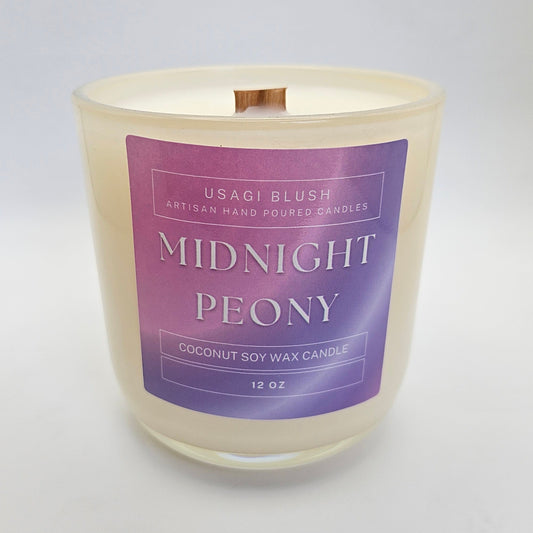 Candle with 'Midnight Peony' label on a white background